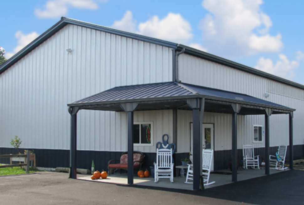 white barn with furniture under the roof